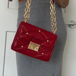 Michael Kors Serena Small Flap Crossbody bag. Color Chili